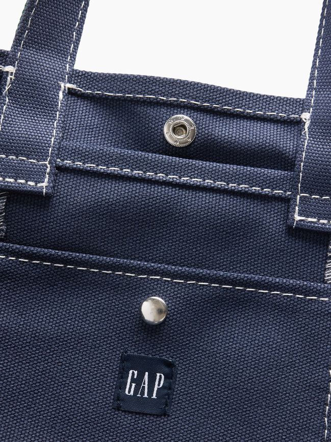 حقيبة يد صغيرة من قماش الكانفاس للأطفال بشعار Gap حقيبة يد صغيرة من قماش الكانفاس للأطفال بشعار gap